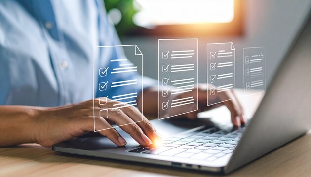 Person completing online forms on a laptop